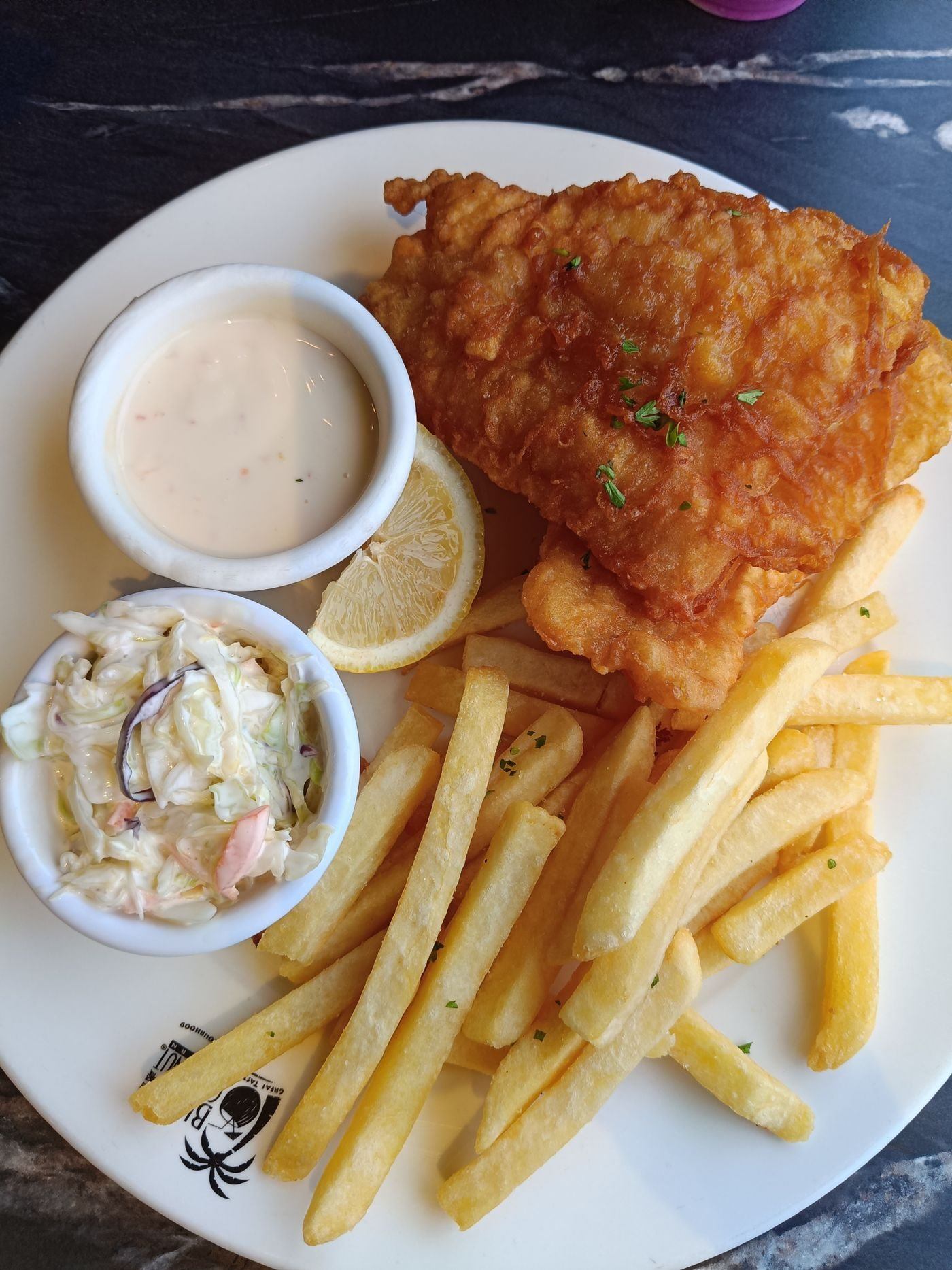 Crispy Fish and Chips with Coleslaw and Sauce — illustrative Pexels photograph