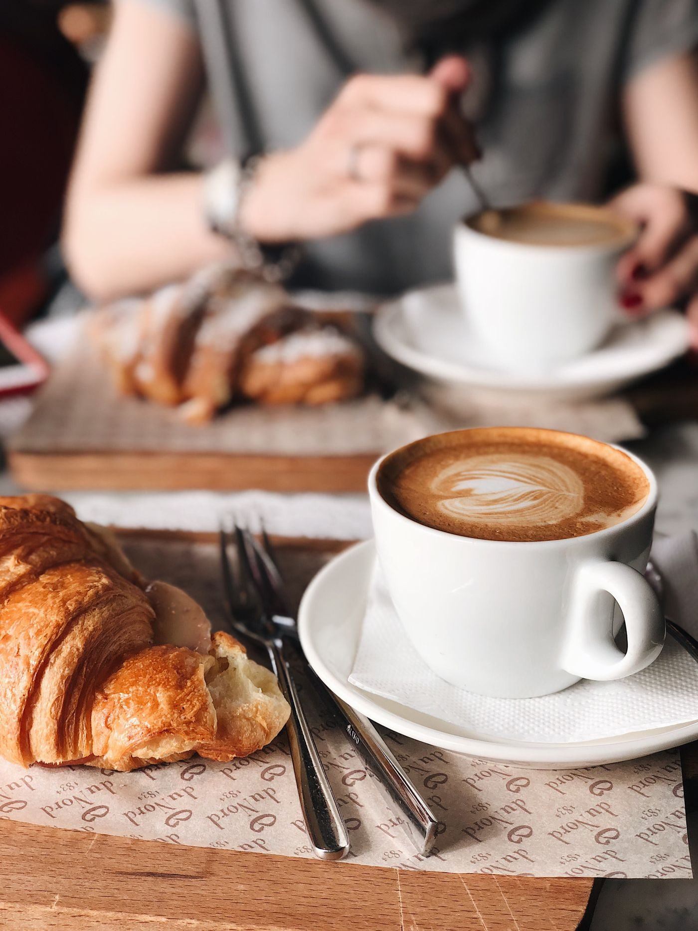 Coffee and Croissant Breakfast in Cafe — illustrative Pexels photograph