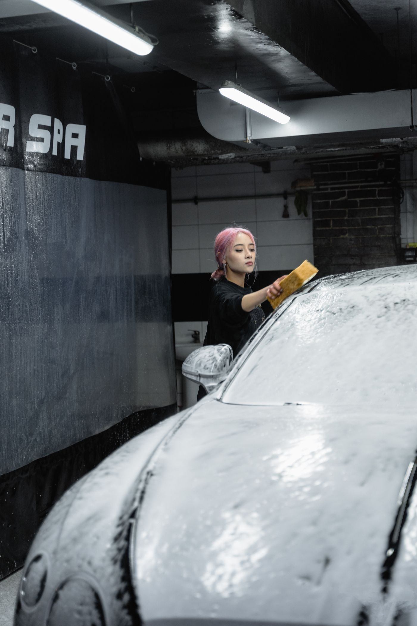 Hand washing a car — illustrative Pexels photograph